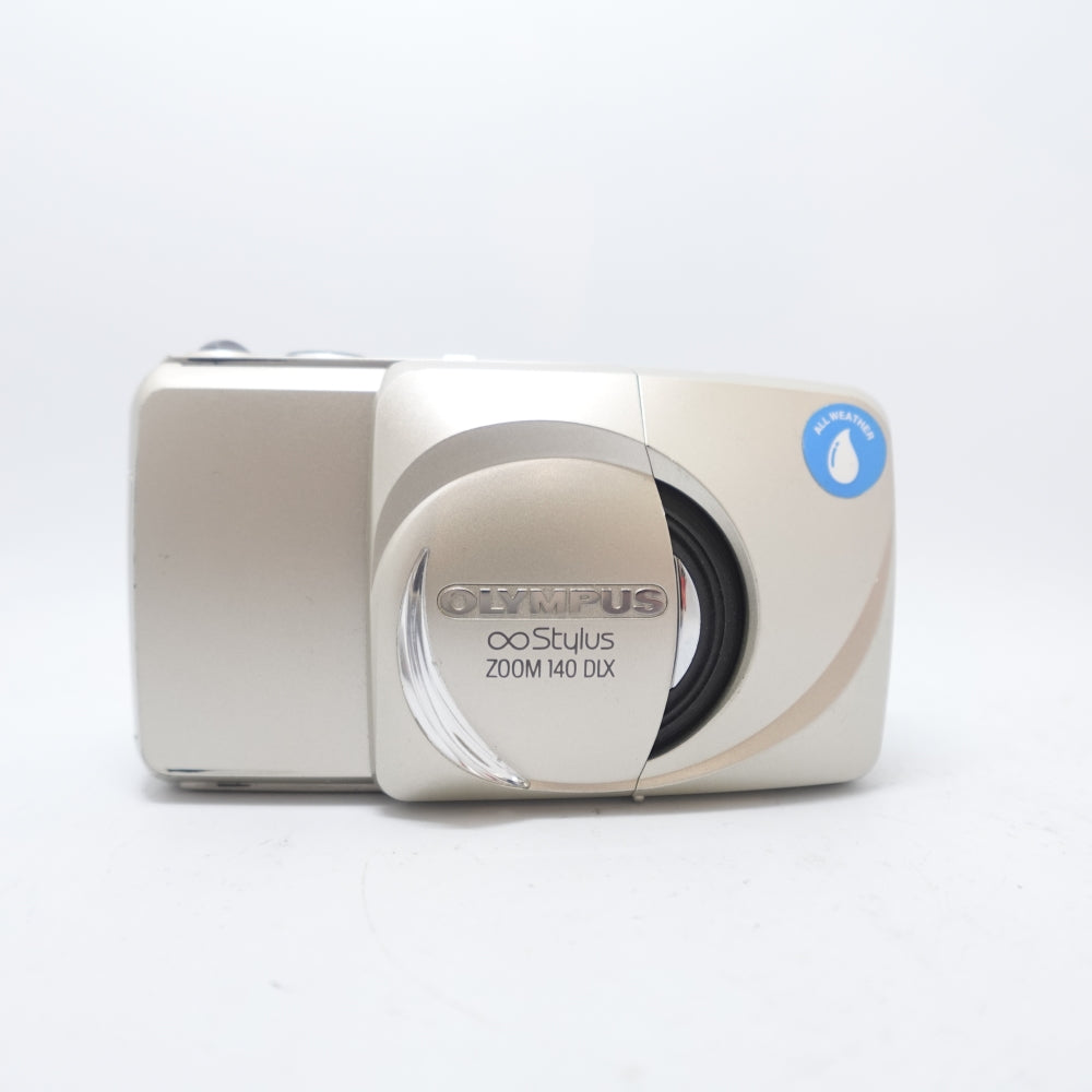 Used Olympus Infinity Stylus Zoom 140 35mm Point and Shoot Camera | Silver | U9