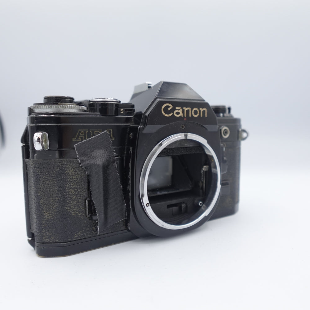 Used Canon AE-1 35mm SLR Camera Body | Black | U8