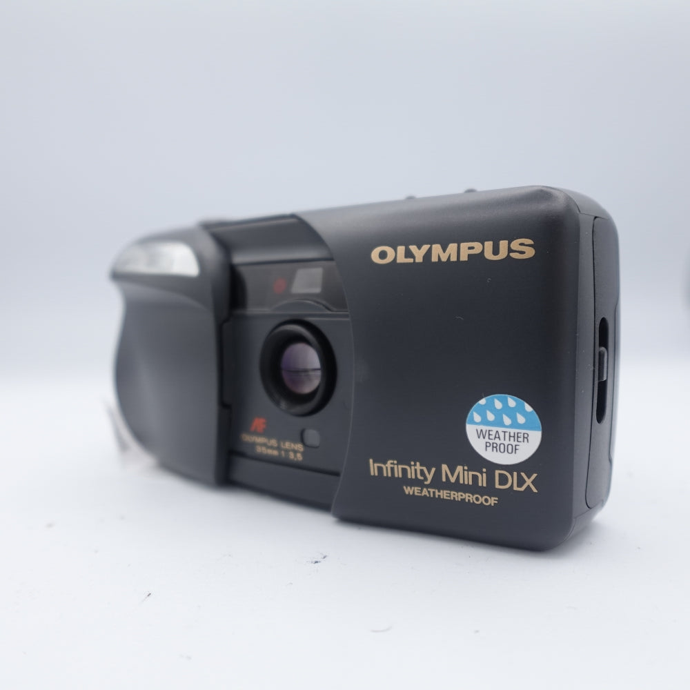 Used Olympus Infinity Mini DLX 35mm Point and Shoot Camera | Grey | U8