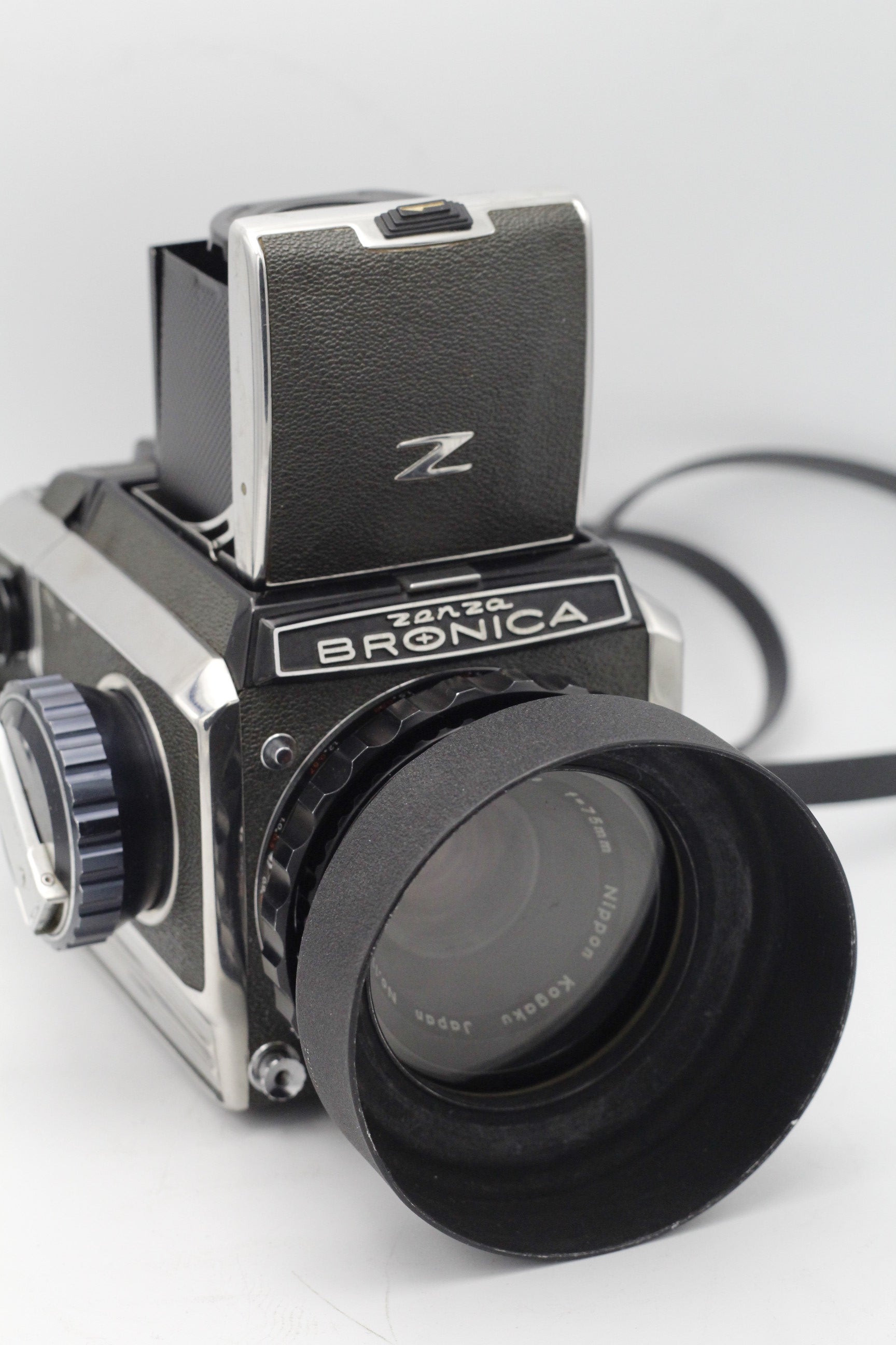 Used Bronica Zenza S2 with 120 film back and Nikkor-P 75mm f/2.8 lens with Metal Lens Hood - Used Very Good